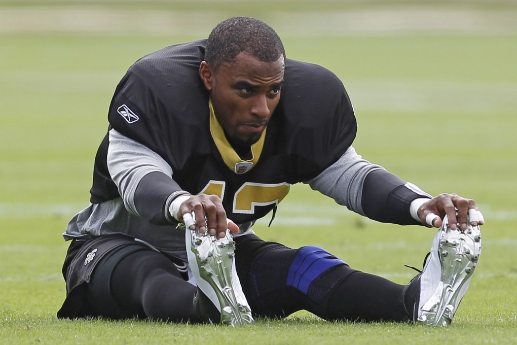 Former Super Bowl winner Darren Sharper has been charged with drugging and raping two women. Photo: Reuters