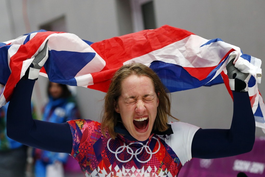 Britain's Lizzy Yarnold celebrates  after winning the women's skeleton event at the Winter Olympics. Photo: Reuters