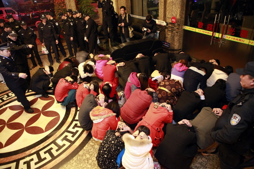 6,000 police raided almost 2,000 entertainment venues in Dongguan last week. Photo: AP