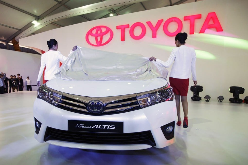 Toyota has posted huge profits on the back of sharply weaker yen since Prime Minister Shinzo Abe swept to power in late 2012.