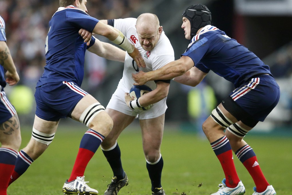 England's Dan Cole is tackled during the game against France. Photo: Reuters