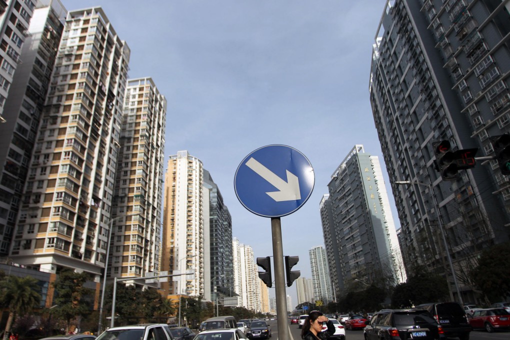 Residential buildings line the streets of Wenzhou. The prices of properties in the city have fallen sharply in recent times. Photo: Imaginechina