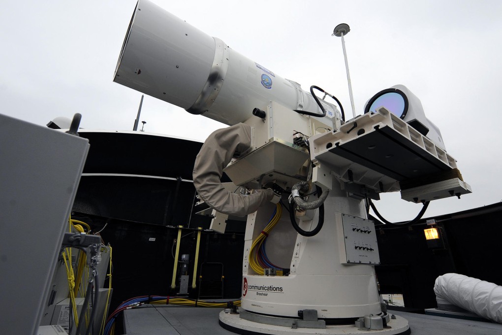 A test laser weapon sits on a US Navy destroyer. Photo: AP