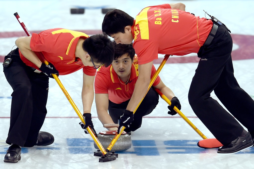 China's Xu Xiaoming (centre) competes against Britain. Photo: Xinhua