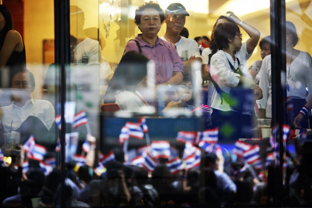 Thailand has cuts its growth estimate for this year to between 3 and 4 per cent because of anti-government protests. Photo: Reuters