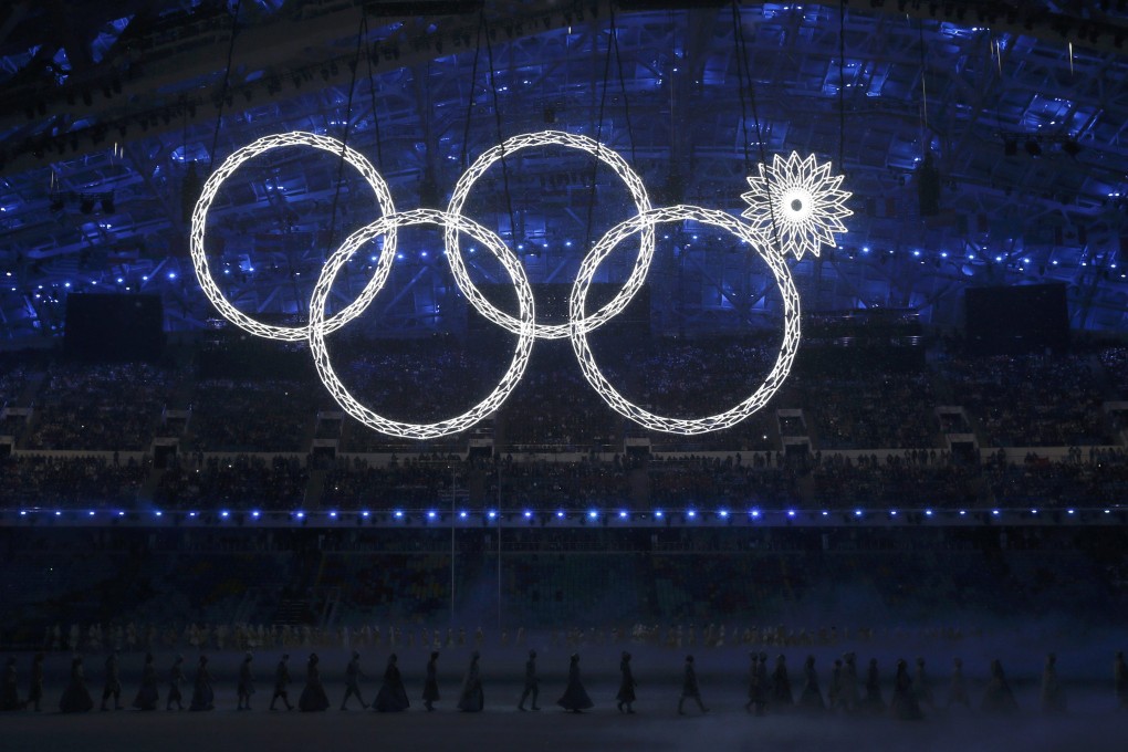 One of Olympic Rings failed to completely illuminate during the opening ceremony, and organisers say this won't happen again. Photo: Reuters