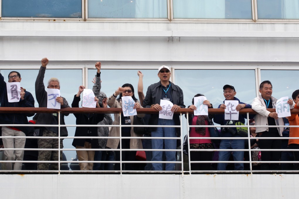 Passengers refused to leave Costa Victoria and demand compensation two weeks ago for the cancellation of a stop during their trip to Vietnam. Photo: Edward Wong