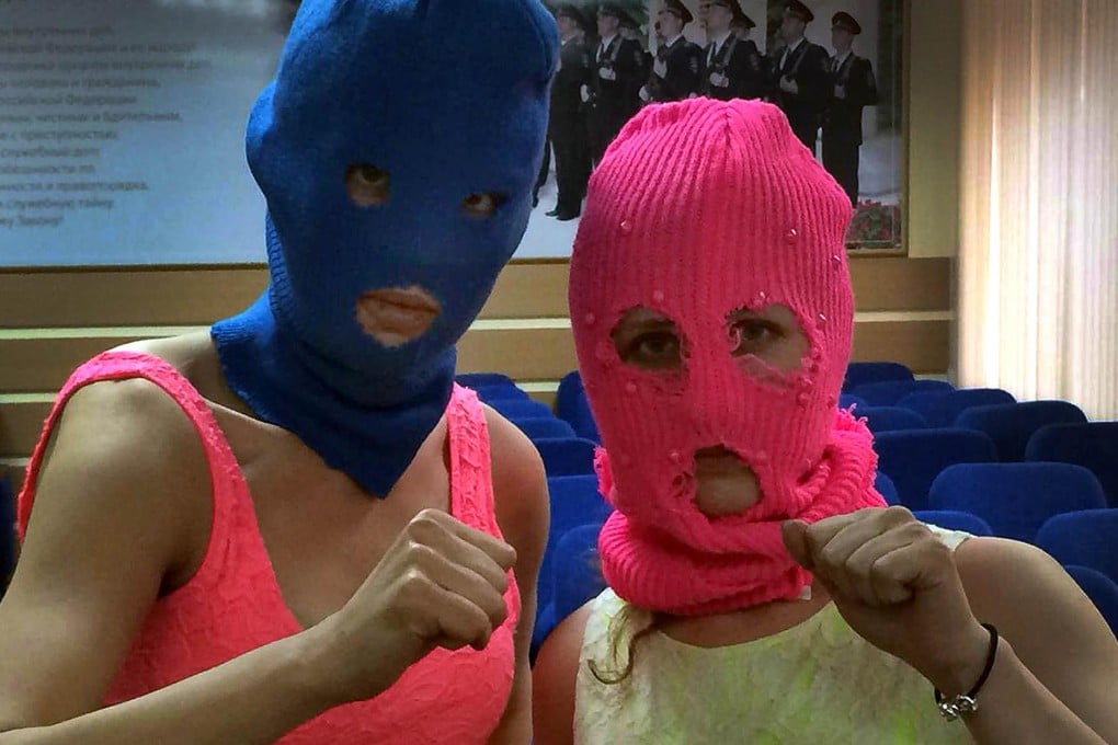 Nadezhda Tolokonnikova (left) and Maria Alyokhina at a police station in Sochi. Photo: AFP
