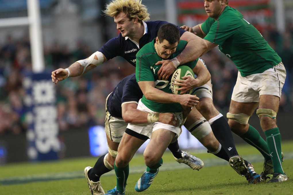 Richie Gray, seen tackling Ireland's Jonathan Sexton, has been recalled for Scotland's clash against Italy. Photo: AP