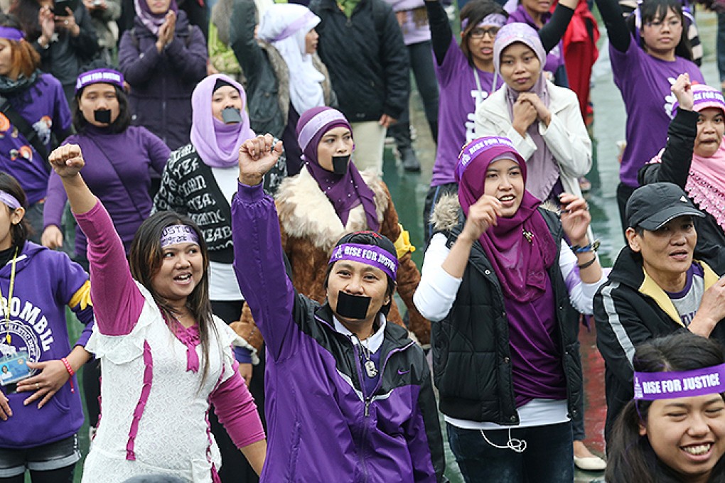 Domestic helpers gather in Victoria Park to march in support of Erwiana, the Indonesian maid who was abused by her Hong Kong employer. Photo: David Wong