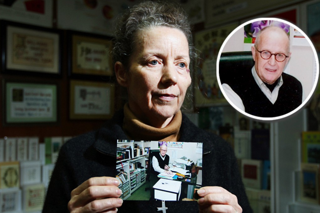 Karen Short with a photo of husband John (inset), feared detained in Pyongyang, at their Christian publishing firm in Tsuen Wan. Photos: Nora Tam, AP