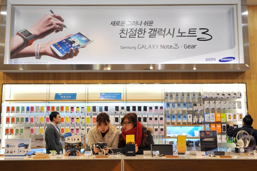 Samsung's new phone, with an improved battery and camera, will be released about the same time as an upgraded Galaxy Gear smart watch. Photo: AFP
