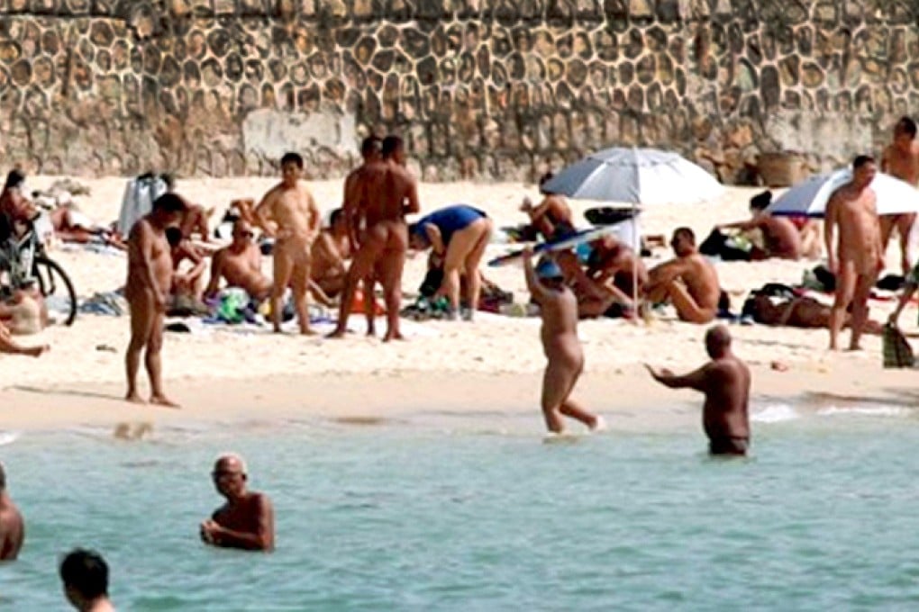 Nude sunbathers at a beach in Sanya. Photo: Xinhua