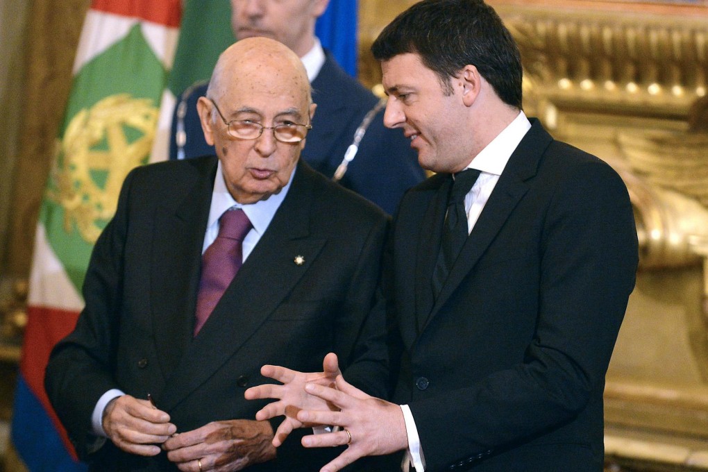 Italian Prime Minister Matteo Renzi (right) with President Giorgio Napolitano during his swearing-in yesterday in Rome. Photo: AFP