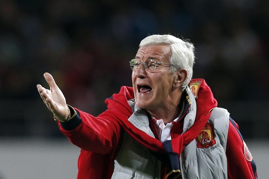 Marcello Lippi is staying with the Asian champions, hoping to defend their title. Photo: AP