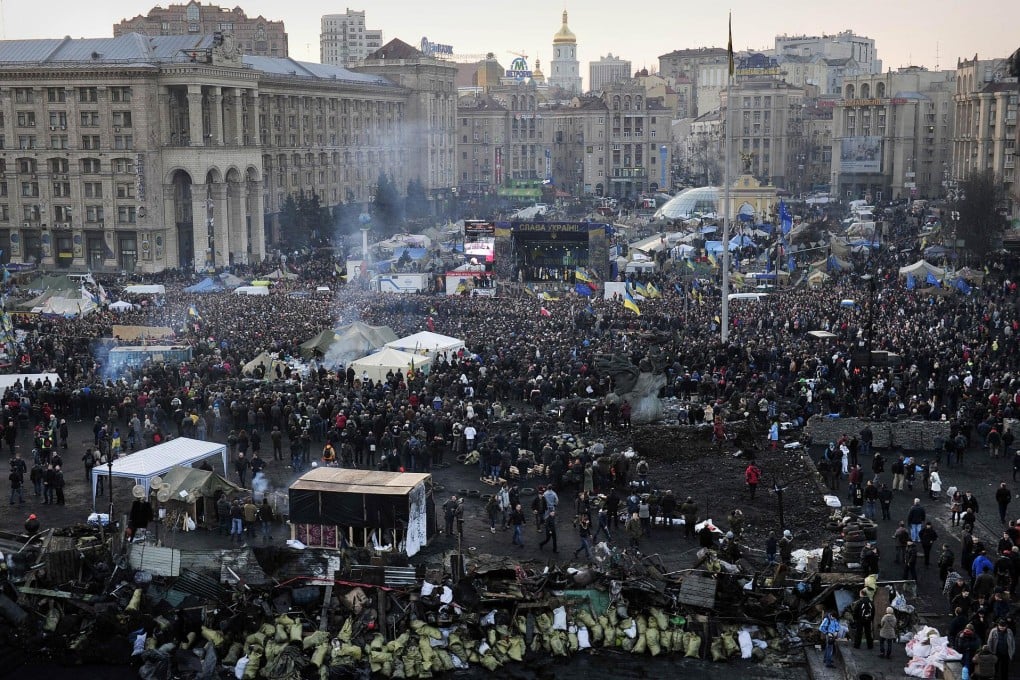 Crowds in Independence Square jeered opposition leaders like Vitaly Klitschko. Photo: AFP