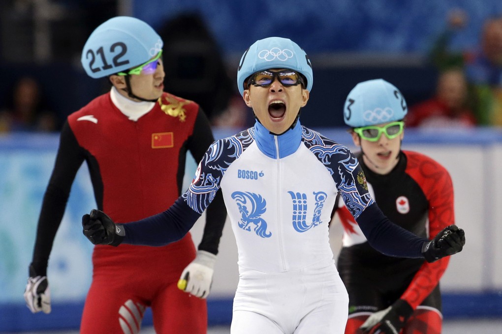 Viktor Ahn celebrates his victory over Wu Dajing of China and Charle Cournoyer of Canada in the men's 500 metres short track speed-skating final. Photo: AP