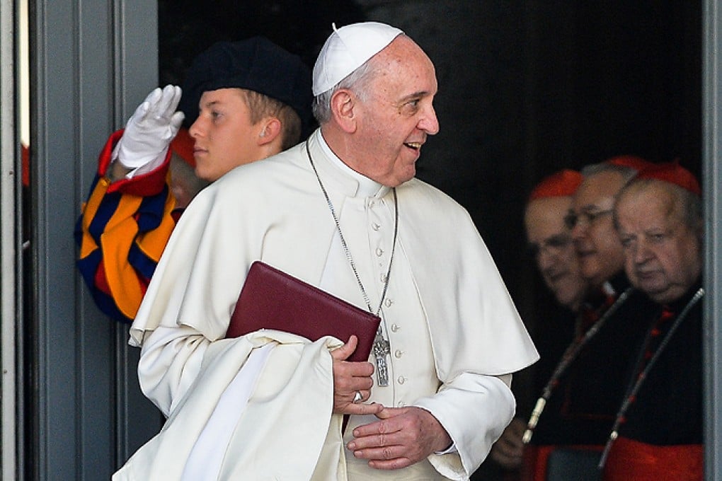 Pope Francis leaves after meeting cardinals at the Vatican on Friday, Photo: AFP