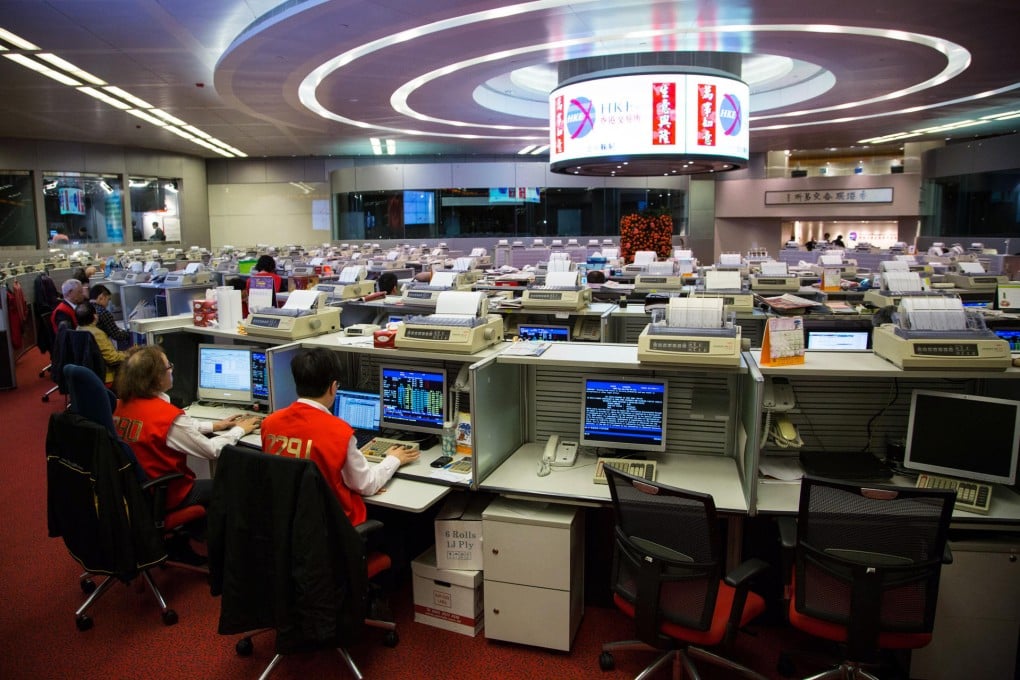 The trading floor of the Hong Kong stock exchange. HKEx will review its listing rules to try to attract more listings. Photo: Bloomberg