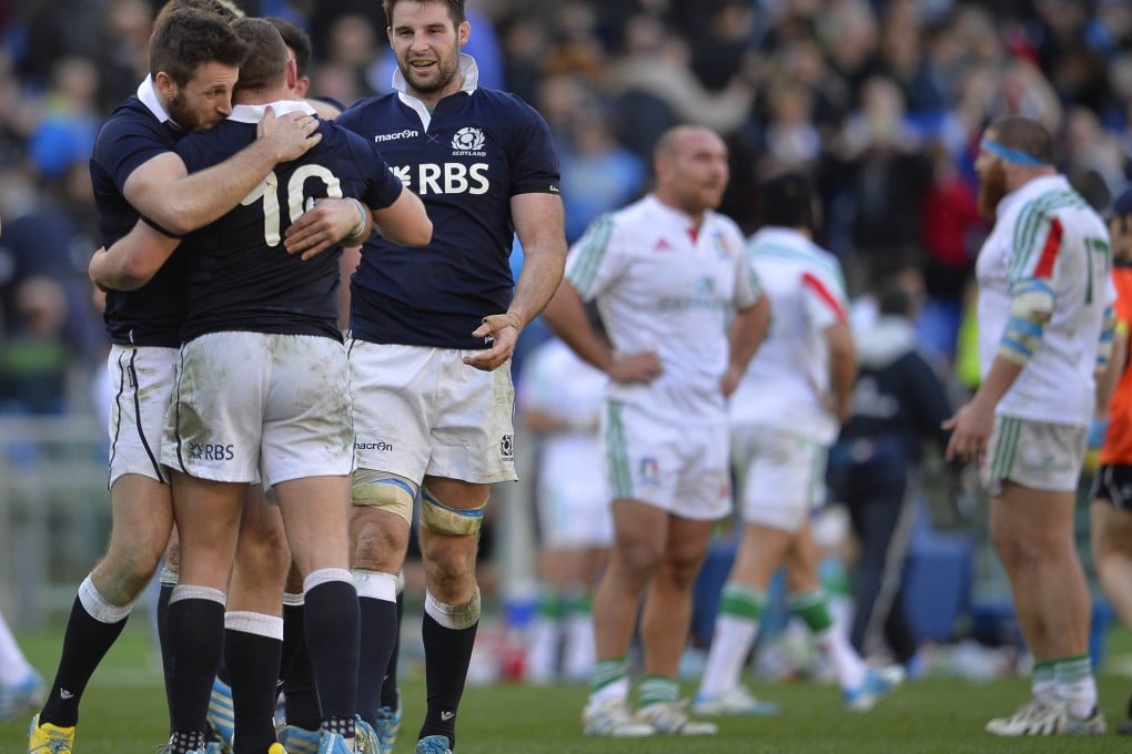 Scotland players celebrate after winning the Six Nations match against Italy in Rome. Photo: AFP