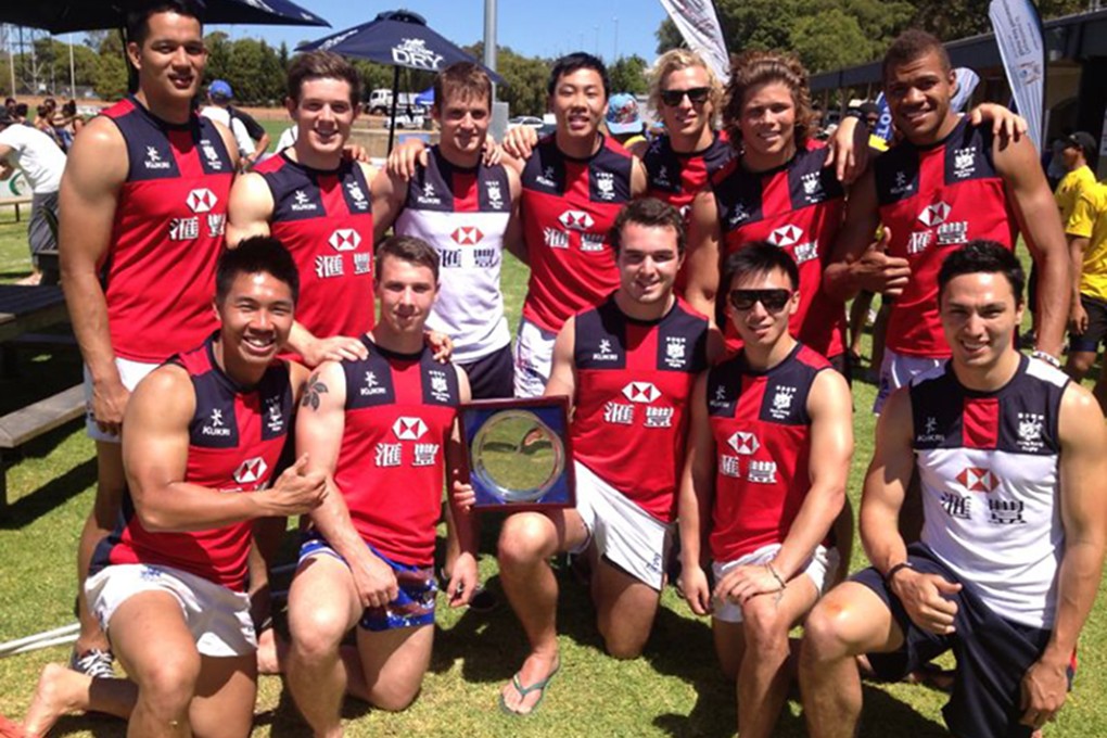 The Hong Kong Dragons celebrate with the silverware after their Plate victory at the Margaret River Sevens. Photo: HKRFU