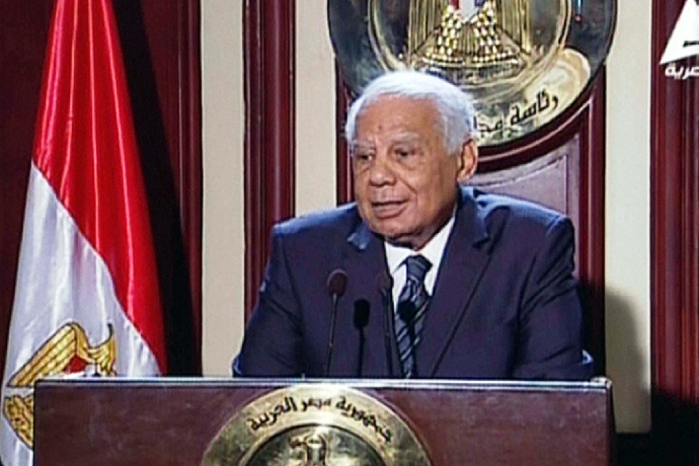 Egypt's Premier Hazem al-Beblawi addresses the media in Cairo. Photo: AFP