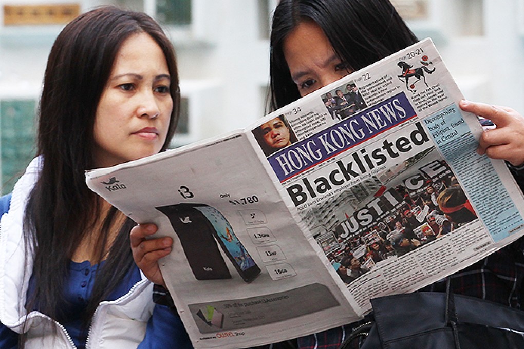 Filipino domestic helpers spend their day off at Chater Garden, Central. Photo: Nora Tam
