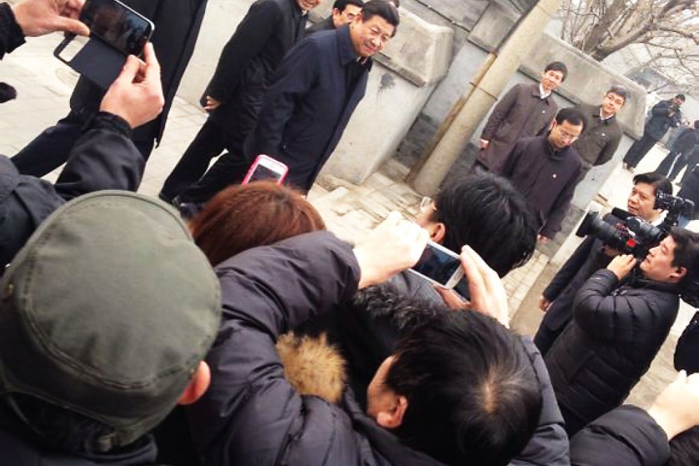 Xi Jinping seen at Nanluoguxiang on Tuesday. Photo: Screenshot via Sina Weibo