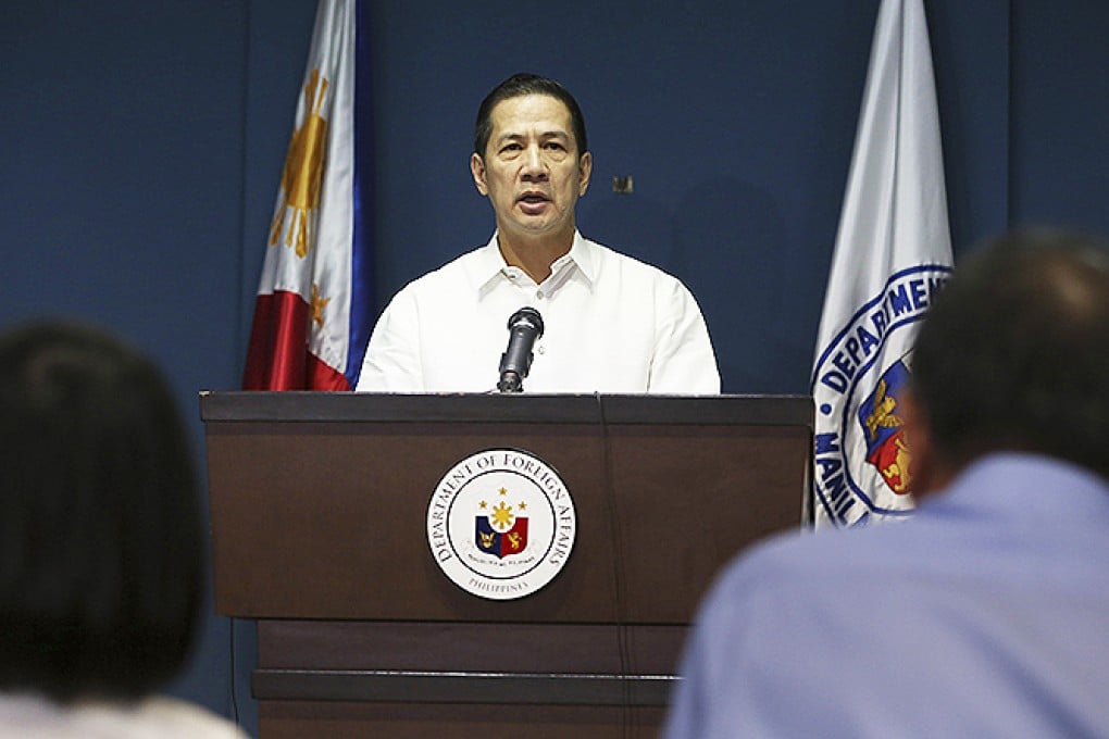 Philippine Foreign Affairs Department spokesman Raul Hernandez. The Philippines summoned China's envoy to protest what it says was the firing of a water cannon by a Chinese government vessel on Filipino fishermen in a disputed shoal in the South China Sea. Photo: AP