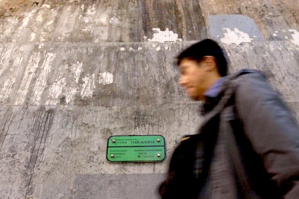 After: signs of scraped concrete testify to a mosaic pattern previously adorning a wall on King's Road. Photo: Felix Wong