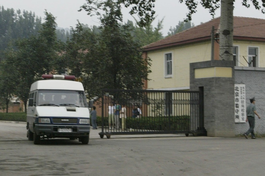 A prison van leaves the Qincheng Prison in Beijing. Initially, the mainland prisons could decide on paroles. But the right to do so was returned to the courts in 1996.