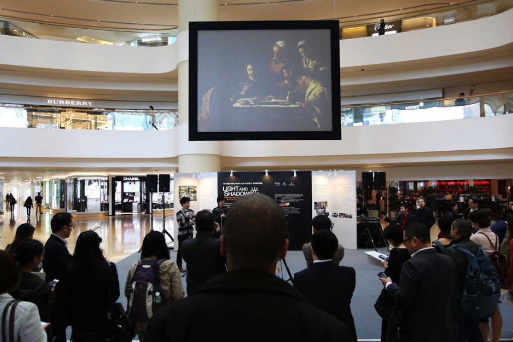A preview of the Caravaggio exhibition is held amid the other big names in Pacific Place. Photo: Sam Tsang