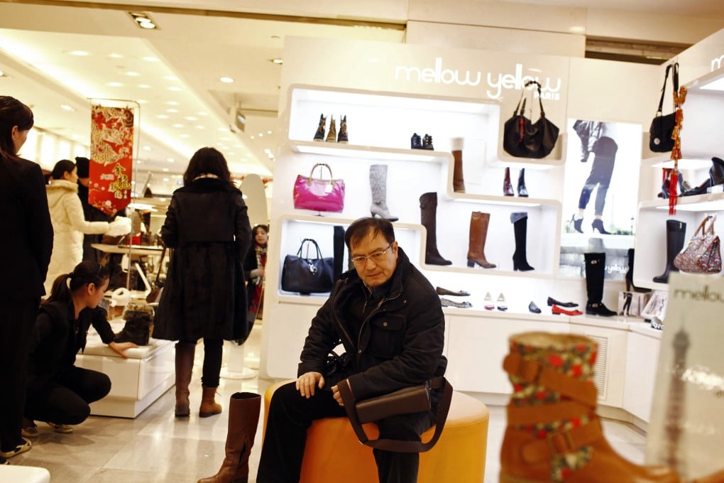 New World Department Store China is moving away from the traditional department store model towards a hybrid mall business. Photo: Bloomberg