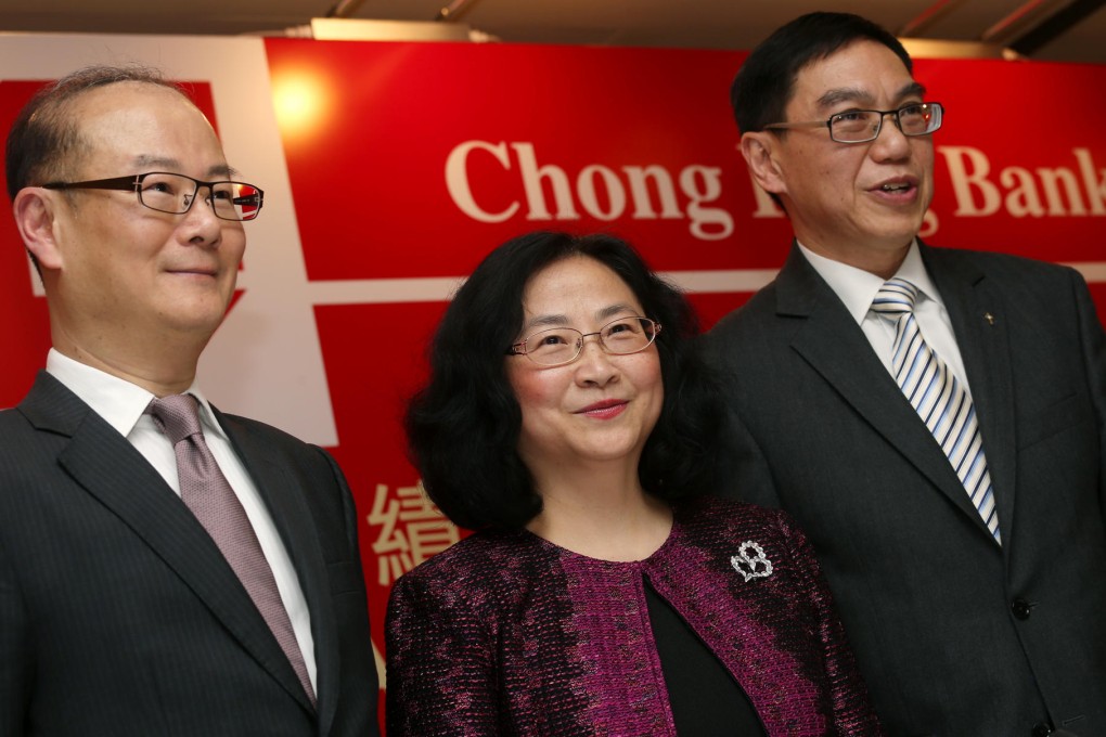 Chong Hing Bank's chief executive Lau Wai-man (left), with Margaret Leung and chief financial officer Frederick Chan Hoi-kit. Photo: K.Y. Cheng
