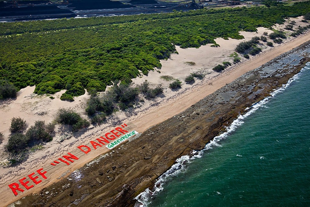 protest against the proposed coal port at Abbot Point, reading 'Reef In Danger', at the Great Barrier Reef in Queensland. Photo: EPA/Greenpeace
