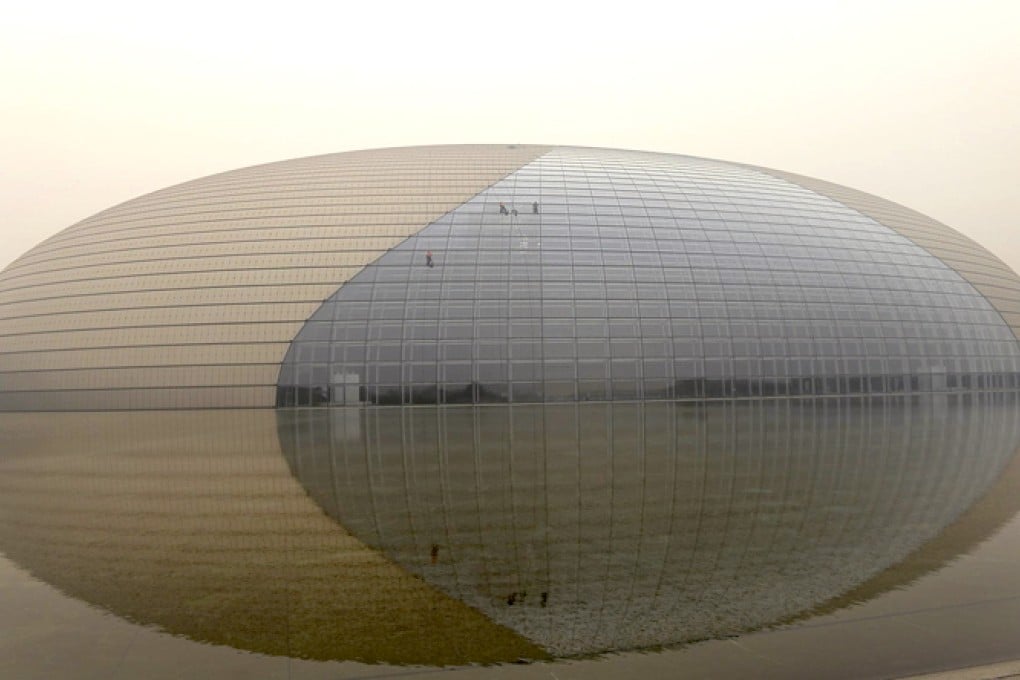 The National Centre for the Performing Arts, like much of Beijing, was enveloped in smog yesterday. Photo: AFP