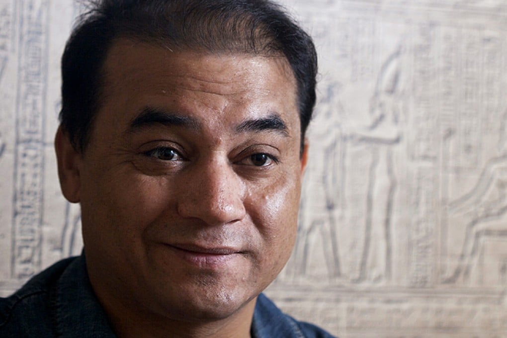 Uygur human rights activist Ilham Tohti pictured in his Beijing home in April, 2010. Photo: Ricky Wong