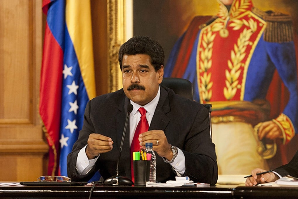 Venezuela's president, Nicolas Maduro, speaks at the Miraflores Palace in Caracas, on Wednesday. Photo: EPA