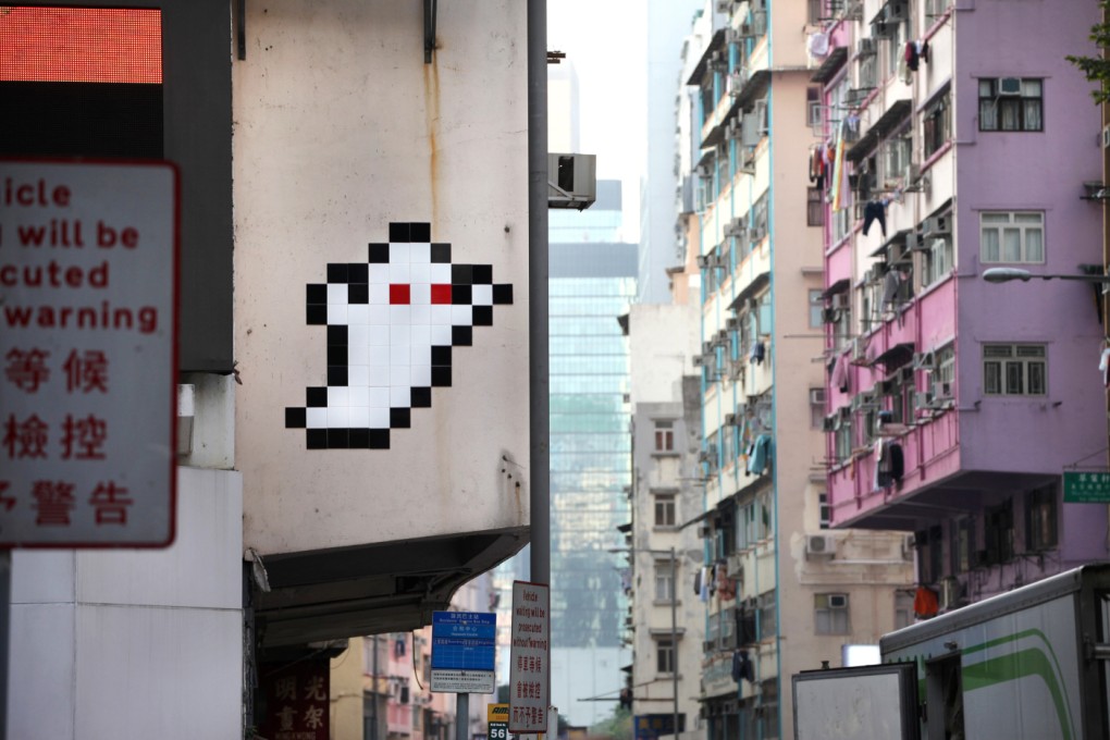 Invader's name is inspired by the 1978 arcade game Space Invaders. His works are inspired by the pixel images in arcade games from the 1970s and 80s. Photo: Space-Invaders.com
