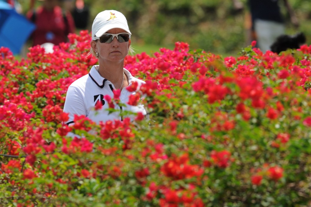 Karrie Webb walks towards the 7th tee during round two of the 2014 HSBC Women's Champions tournament in Singapore. Photo: AFP