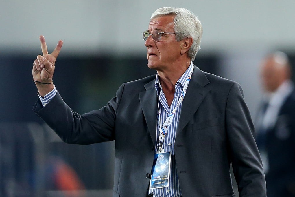 World Cup-winning coach Marcello Lippi will remain at the helm of Guangzhou Evergrande until 2017. Photo: AFP