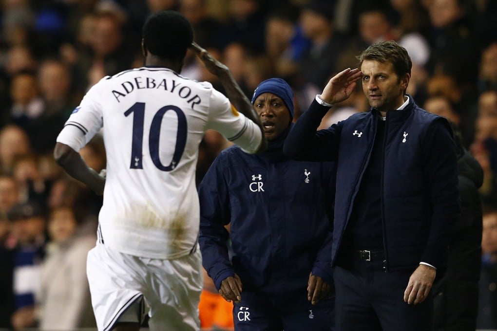 Emmanuel Adebayor celebrates with manager Tim Sherwood. Photo: Reuters