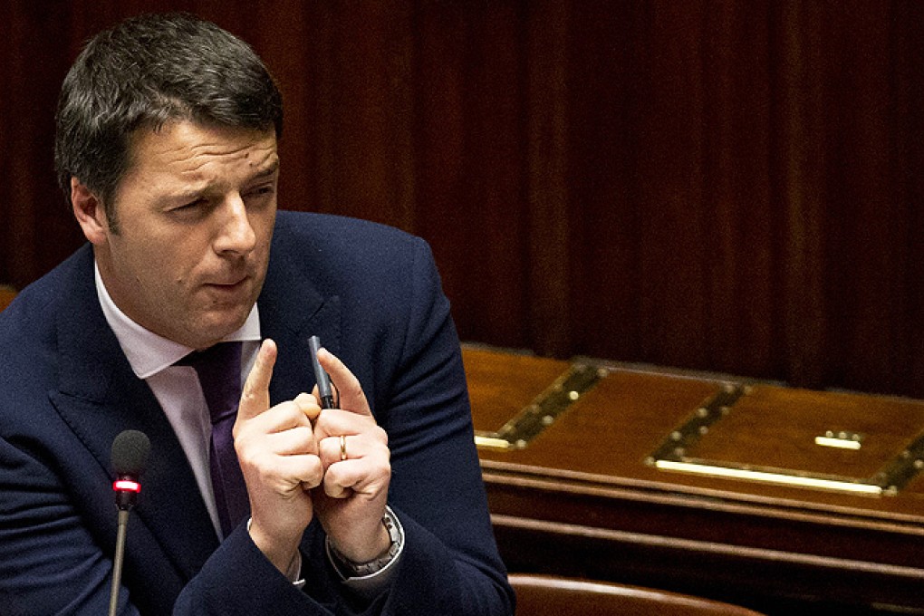 Italian premier Matteo Renzi delivers a speech to the Chamber of Deputies in Rome. Photo: AP