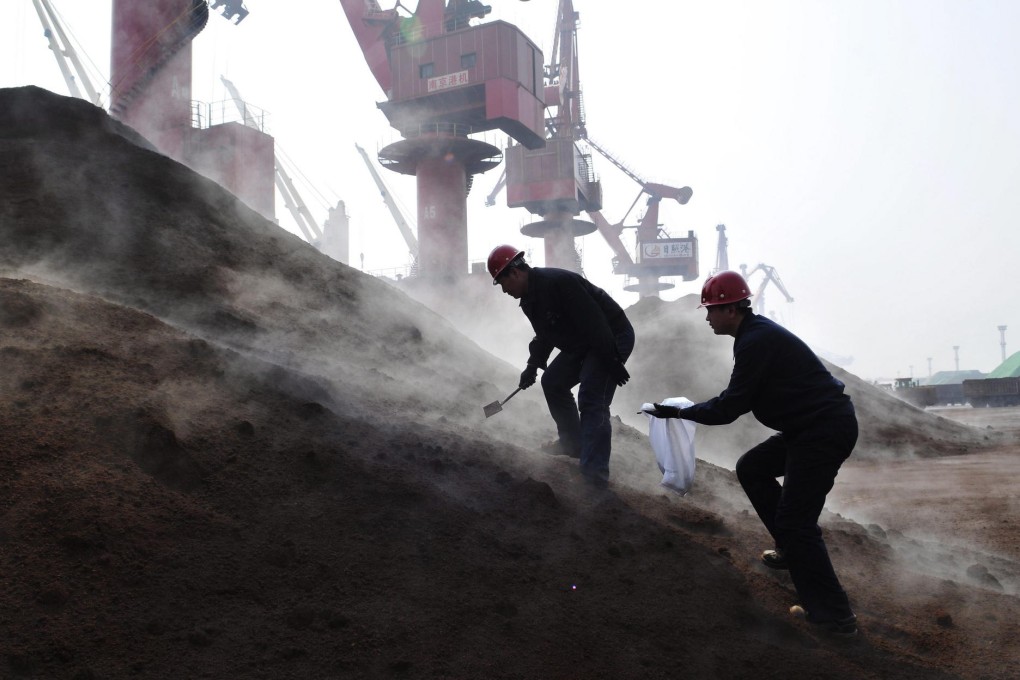 Iron ore stock on the mainland hit a record in February despite slowing growth in steel output. Photo: EPA