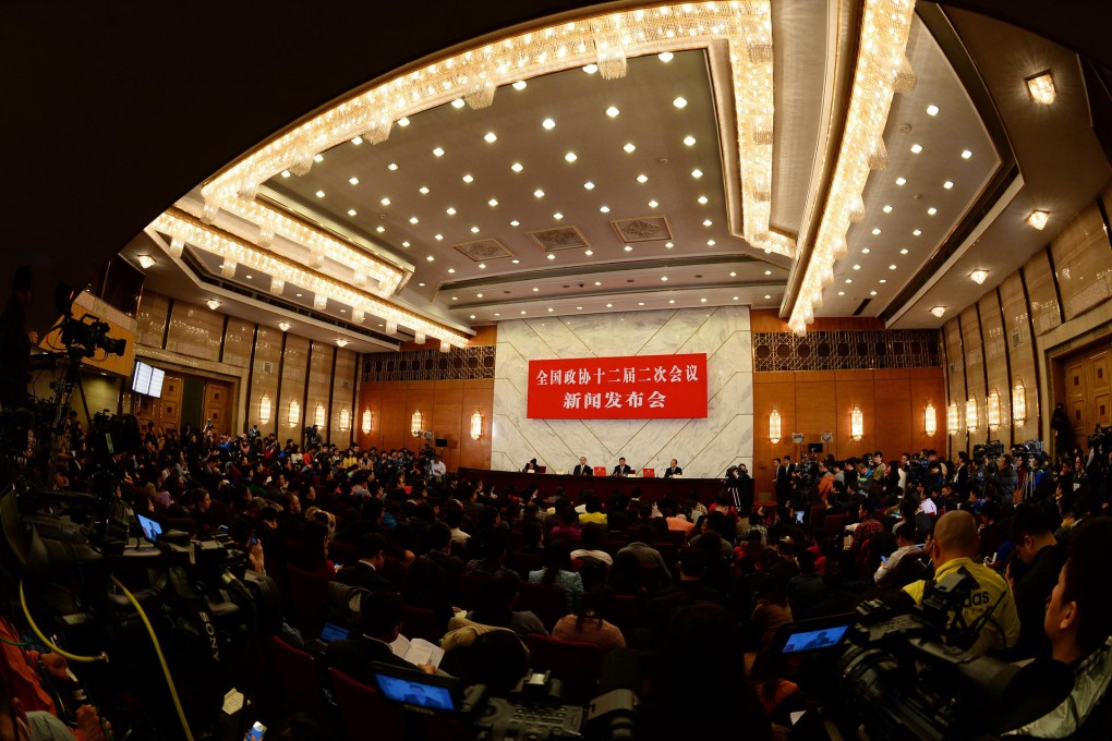 Media gather for a press conference on the Chinese People's Political Consultative Conference in Beijing. Photo: Xinhua