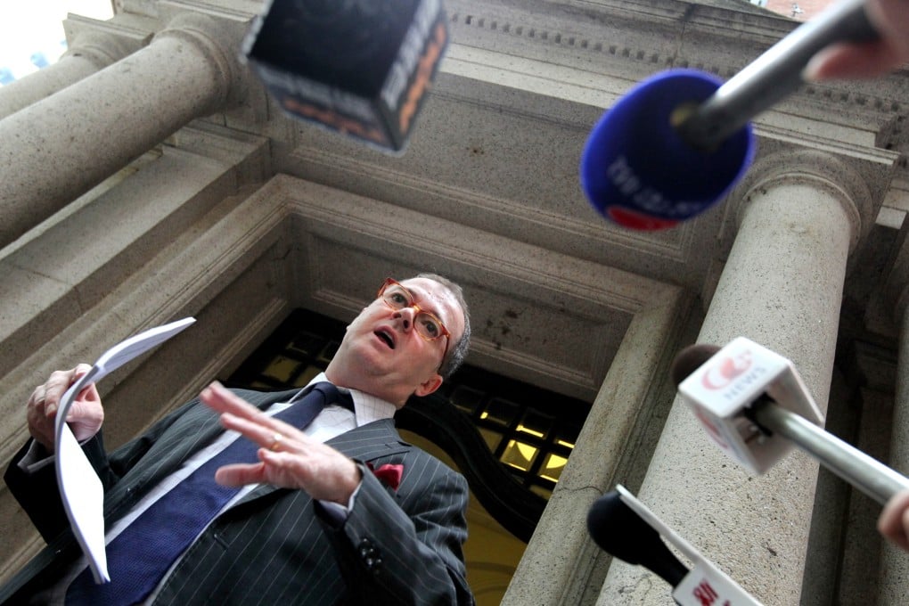 Michael Vidler, lawyer for W, speaks to media outside Court of Final Appeal after the court ruled that transsexuals have the right to get married in May last year. Photo: K. Y. Cheng
