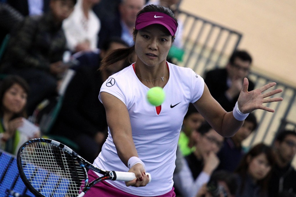 Li Na wasn't at her best when she lost to Australia's Sam Stosur 6-4, 6-3 in the BNP Paribas Showdown exhibition at Tseung Kwan O Velodrome. Photo: Dickson Lee