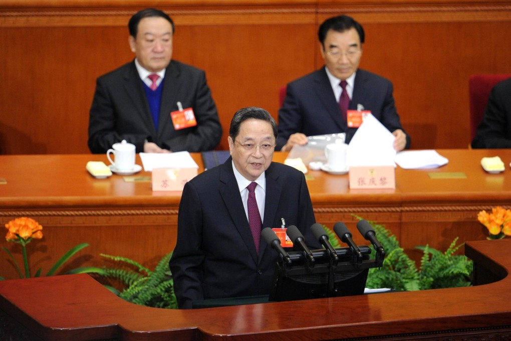 CPPCC chairman Yu Zhengsheng (centre) in Beijing. Photo: AFP
