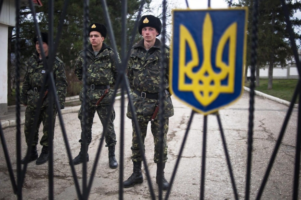 Ukrainian soldiers inside the Perevalne military base. Photo: EPA