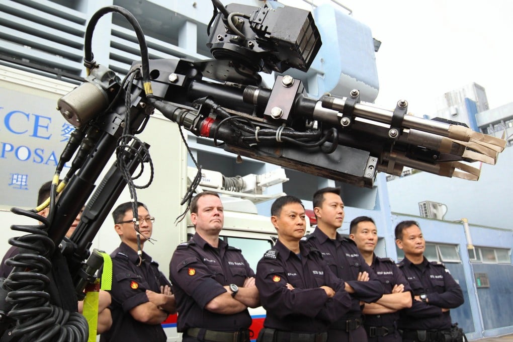 Members of Hong Kong’s bomb disposal team including Jimmy Yuen, front, and, to his right, Adam Roberts. Photo: Dickson Lee